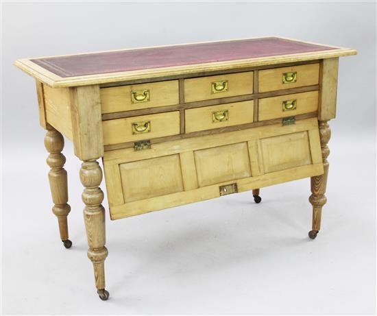A late Victorian pine office table, W.4ft D.1ft 10in. H.2ft 8in.